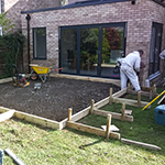 Preparing the foundations for the patio area