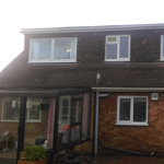 Here, we created a new bathroom space between two dormer windows