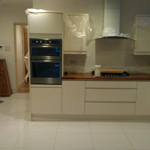 Full kitchen installation including plastering of walls, new services, tiling and decorating